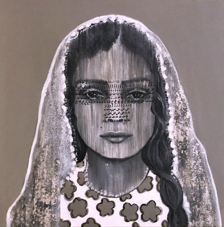 Monochrome portrait of woman with veil and floral dress.