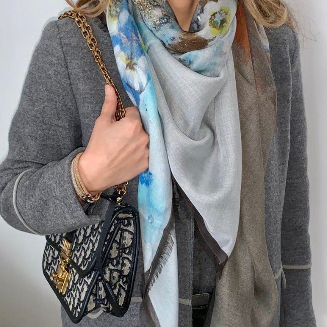 Fashionable outfit with scarf and handbag