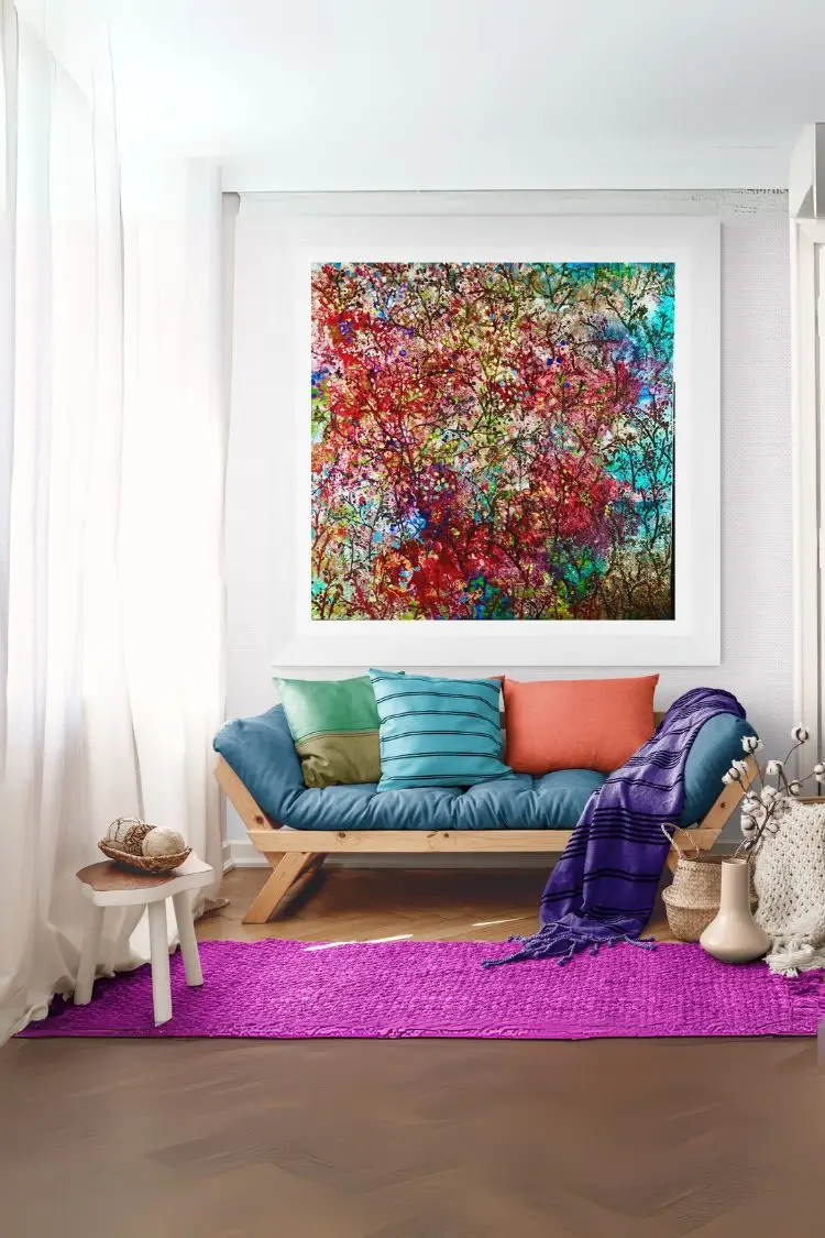 Colorful abstract art above cozy living room sofa