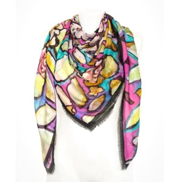 Colorful abstract floral scarf on display mannequin.